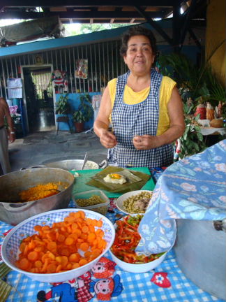 Angela making homemade tamales, a traditional food a Christmas time in Costa Rica