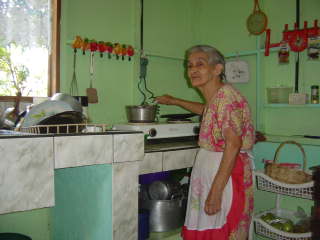 Hortensia in her Atenas, Costa Rica kitchen making tortillas